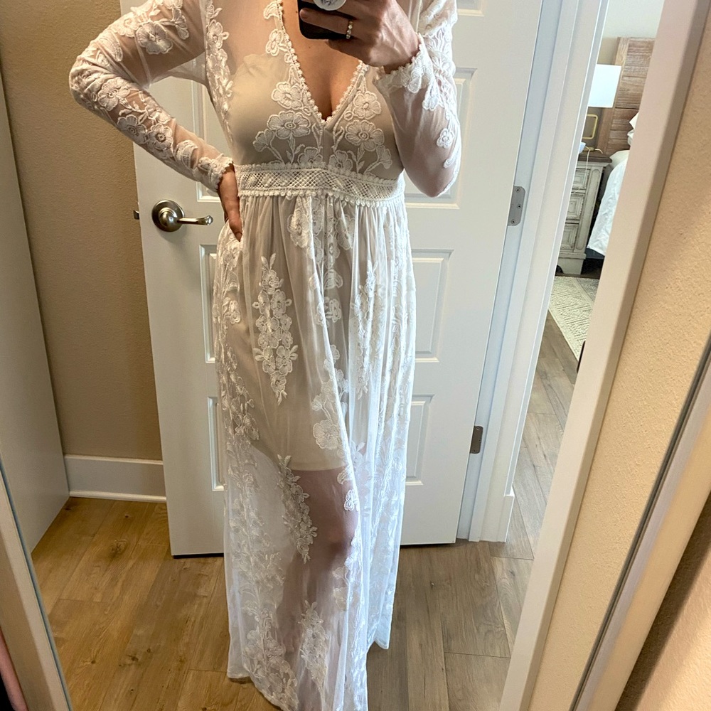 White floor length long-sleeve lace dress